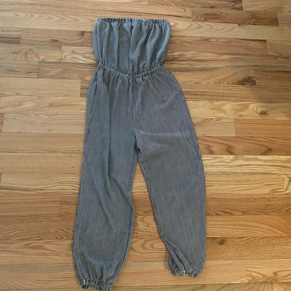 Black and white striped jumper with jogger style on bottom
